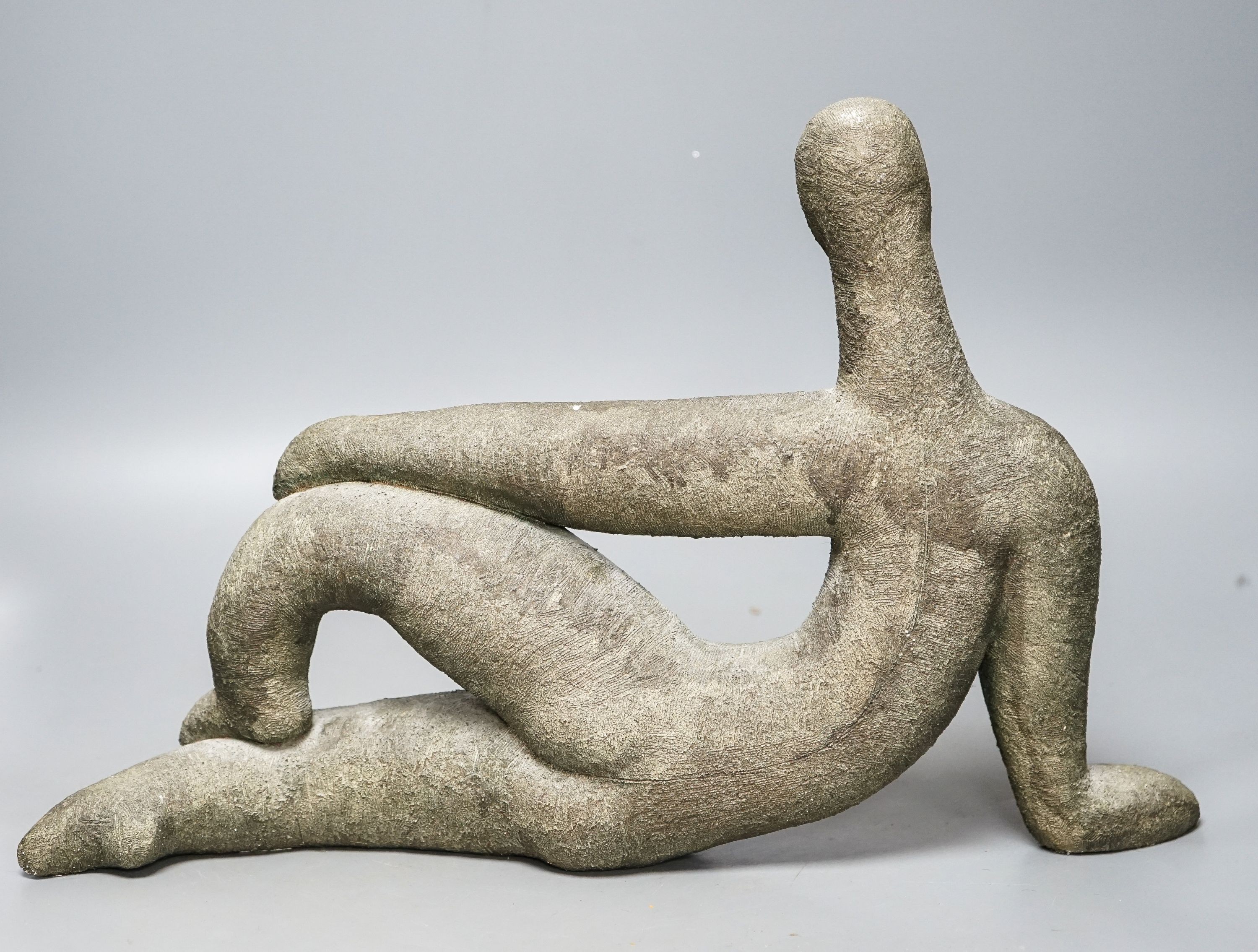 A bronzed pottery abstract figure, marked ‘WP 92’ 40cm